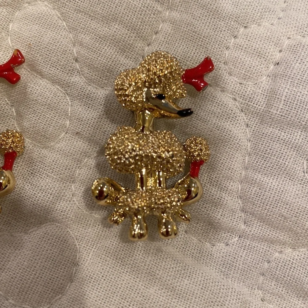 Gold tone poodle pins